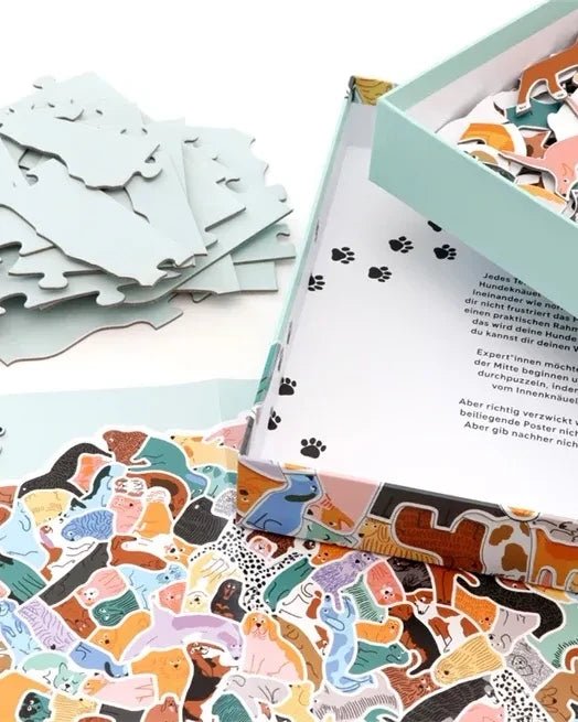 Laurence King Publishing - 299 HUNDE UND 1 KATZE Knäuelpuzzle - ROSA ECK