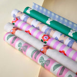 Kado Design - Geschenkpapier-Rolle • Grün Schleifen/Streifen - ROSA ECK