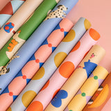 Kado Design - Geschenkpapier - Rolle • Zirkus Pink/Blau/Rot - ROSA ECK