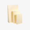 Kado Design - Geschenktüte mit Boden • Kariert Buttergelb - ROSA ECK