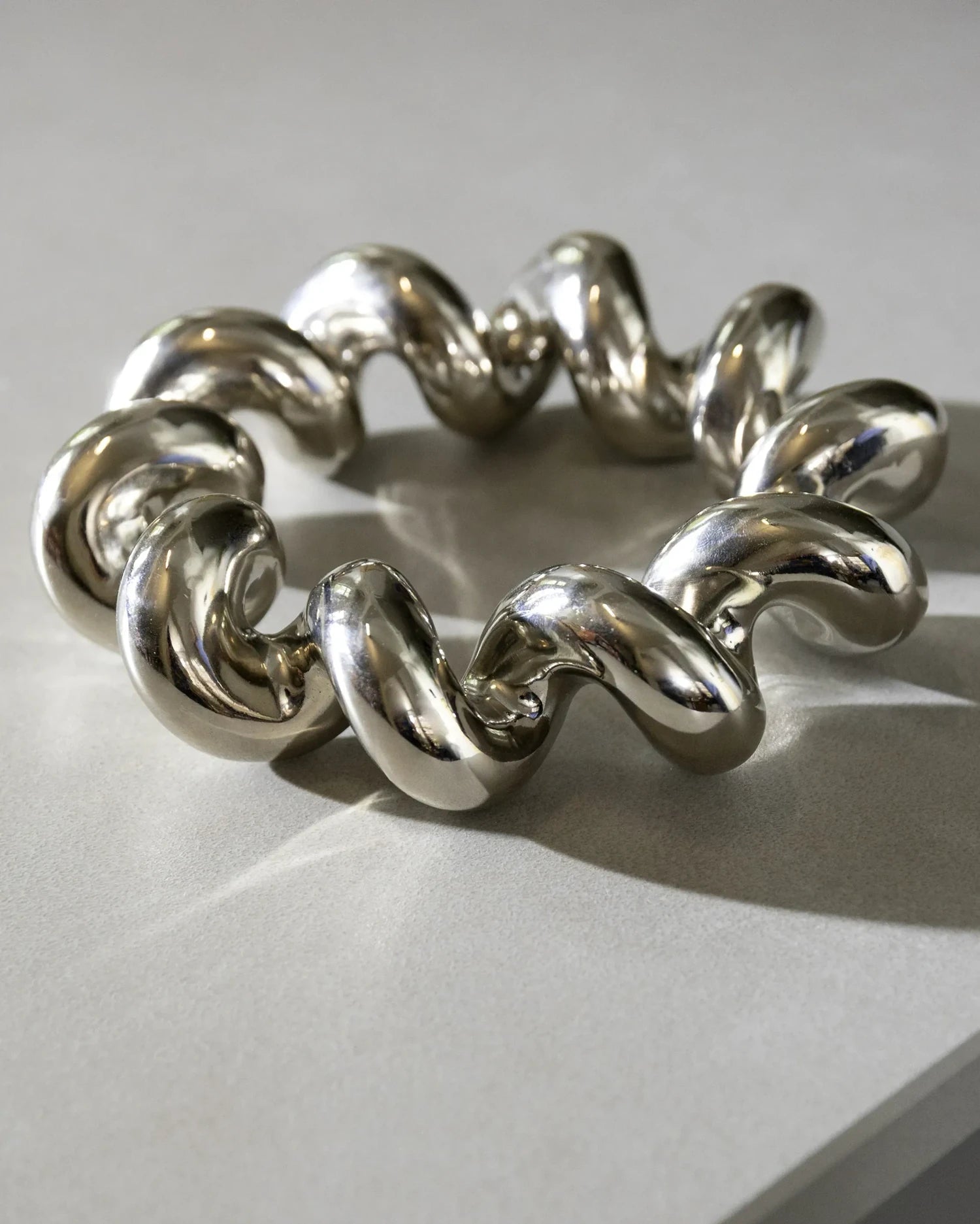 &Klevering - TWIST Topfuntersetzer • silver - ROSA ECK