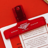 Penco - CLAMPY Große Papierklammer • Clear Red - ROSA ECK