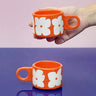 SOMANYBLOBS - FLOWERS Cappuccinotasse (150 ml) • Orange - ROSA ECK