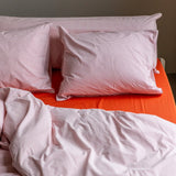 Gestreifter Kissenbezug aus Bio-Baumwolle (80 x 80 cm) • Pink-Ecru