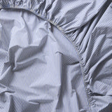 Gestreiftes Spannbettlaken aus Bio-Baumwolle • Blue-Ecru