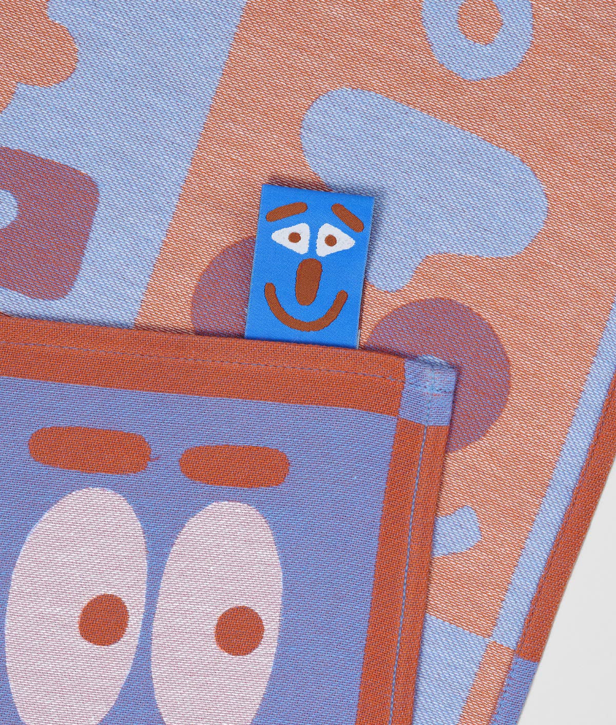 Wrap - FACES Geschirrtuch (50 × 70 cm) • Blue/Brown - ROSA ECK